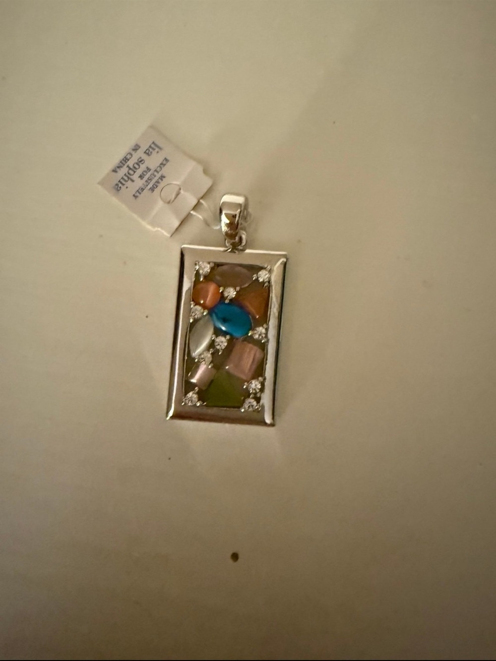 Lia Sophia Galileo Pastel Stone Pendant NWT Appears to be missing a stone.